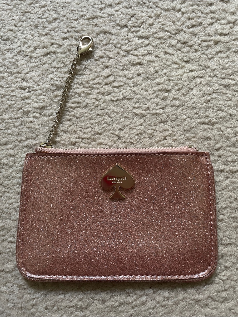 kate spade pink metallic wristlet pouch with gold hardware